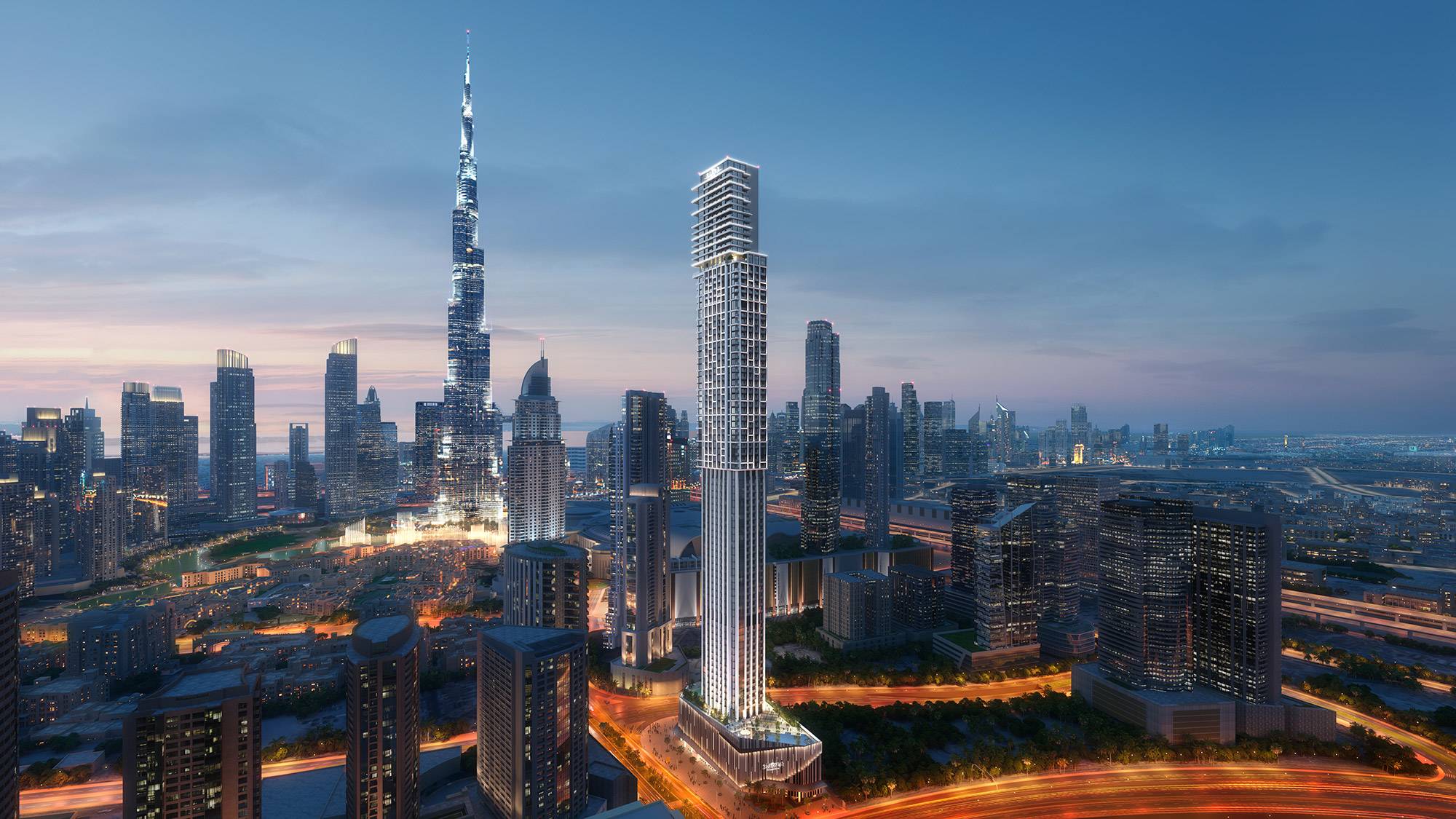 Aedas’ Rixos Financial Centre Road Dubai Residences - supertall mixed-use tower with stepped crown and unitised glass façade in a high-density urban skyline. Aerial dusk view of an Aedas-designed supertall tower with a slender vertical profile, stepped upper volumes and continuous glass curtain wall. The building rises from a podium block within a dense city grid, surrounded by high-rise buildings and arterial roads, indicating integration with metropolitan infrastructure.