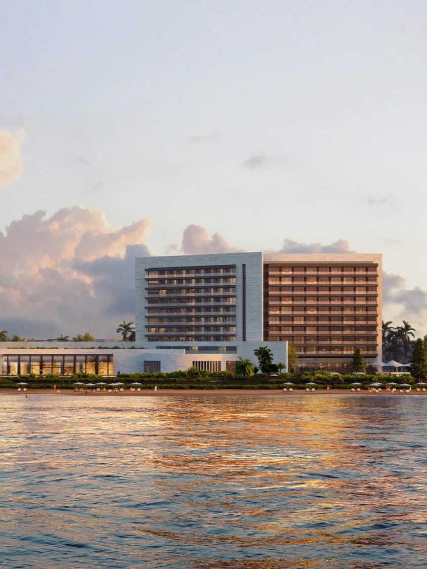 Aedas’s Haikou CGDC Haikou Hotel Project is shown as a waterfront resort complex with a dumbbell‑shaped plan, two terraced guestroom towers, and a linear podium forming an internal courtyard. The exterior highlights horizontal massing, layered balconies, and continuous façade bands facing the Qionghai Sea in Hainan.
