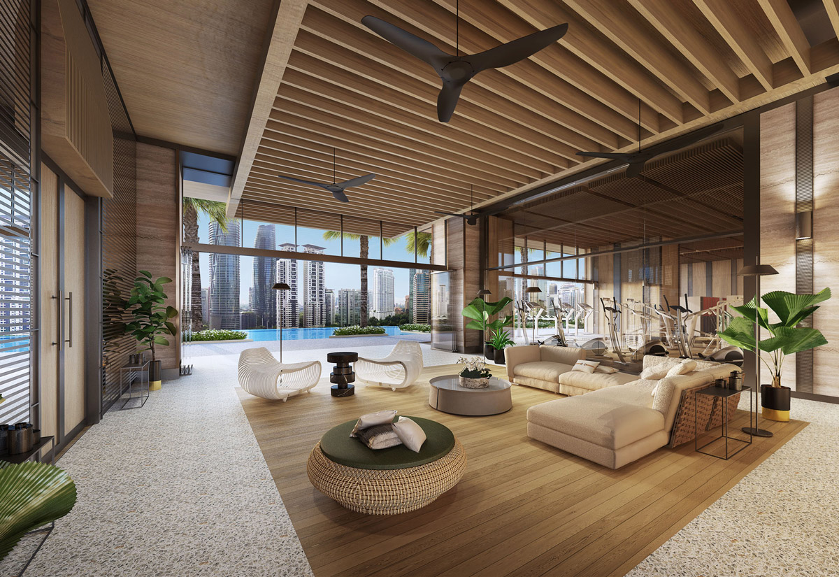 Aedas Interiors’ Jumeirah Hotel in Kuala Lumpur is shown as a serene, resort‑style lounge and fitness environment with timber slat ceilings, ceiling fans, soft neutral seating, and floor‑to‑ceiling glazing opening to a rooftop pool and city skyline. The image highlights a refined hospitality interior blending natural materials, indoor‑outdoor continuity, and relaxed luxury suited to an urban tropical setting.