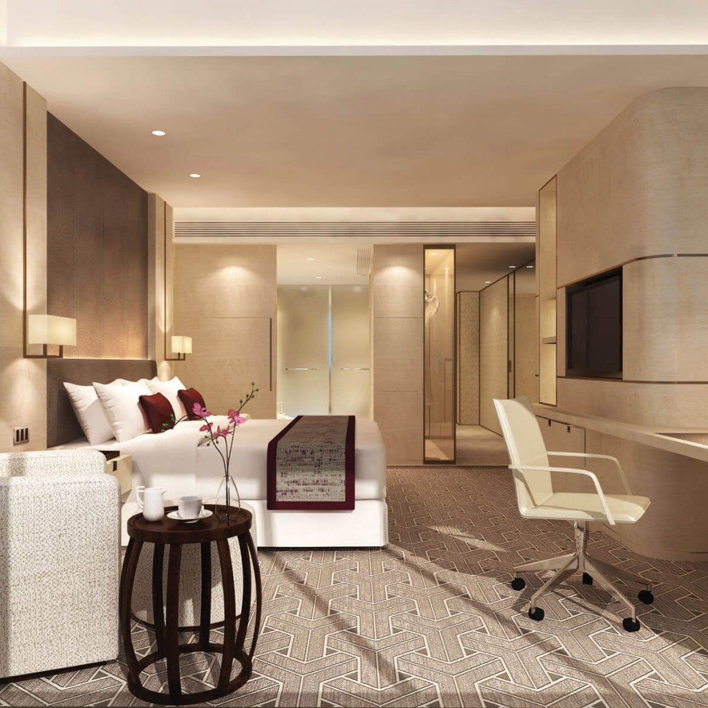 Aedas Interiors’ Langham Place Hotel Datong is shown as a refined guestroom interior with calm neutral tones, soft stone wall panels, dark timber accents, and patterned carpeting. The image highlights a contemporary hospitality space that blends modern luxury with subtle references to Shanxi heritage through minimalist forms, balanced proportions, and understated traditional motifs integrated into furniture and finishes.