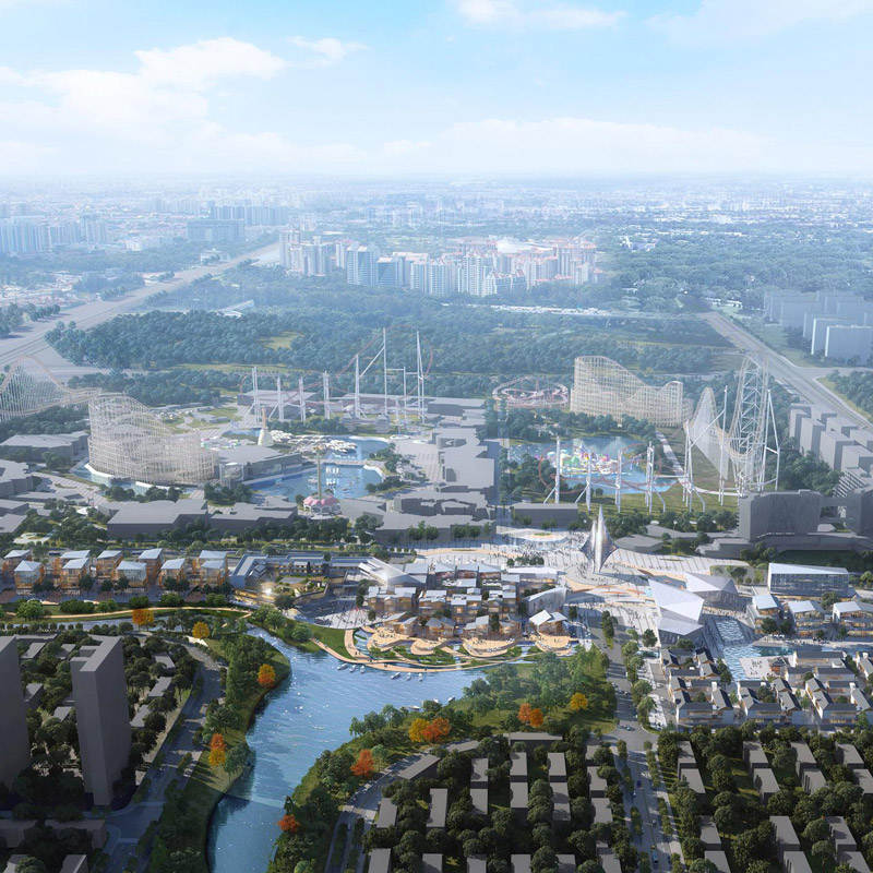 Aedas’ Xiangyang OCT Cultural & Tourism Development Area – Joy Town is shown as a large‑scale, immersive cultural and leisure masterplan organised around water features, courtyards, and sculptural pavilion forms. The aerial view highlights a festive resort gateway integrating commercial streets, hotels, cultural venues, and landscaped public realms, drawing inspiration from Xiangyang’s historic piers and transportation heritage to create a vibrant, experiential destination.
