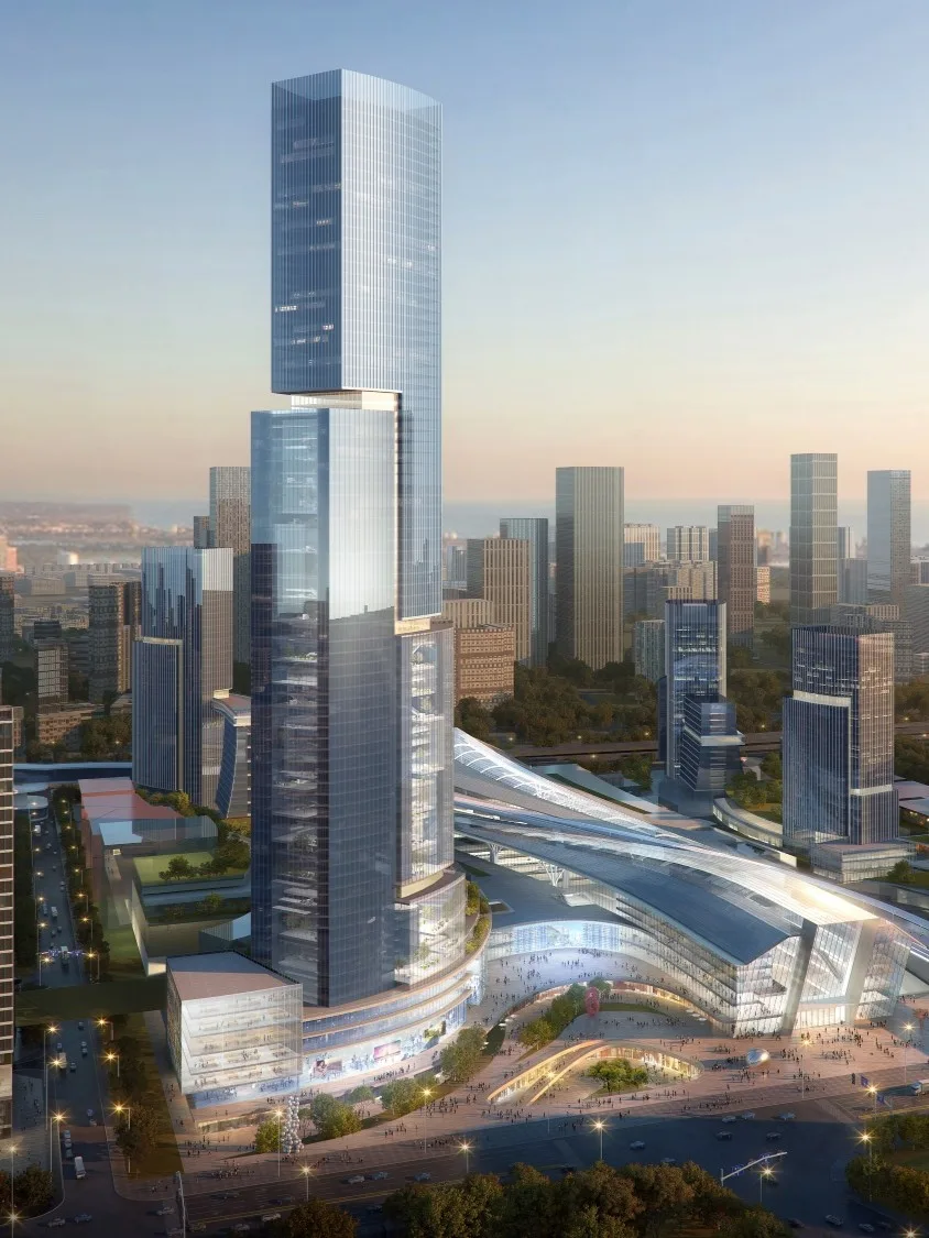 Aedas’s urban design for the Xili Integrated Transportation Hub Area is depicted as a high‑density transit‑oriented district with landmark high‑rise towers, a centrally integrated transportation concourse, and podium‑based mixed‑use blocks. The image highlights layered mobility infrastructure, vertical density, and large‑scale TOD masterplanning within Shenzhen’s metropolitan context.